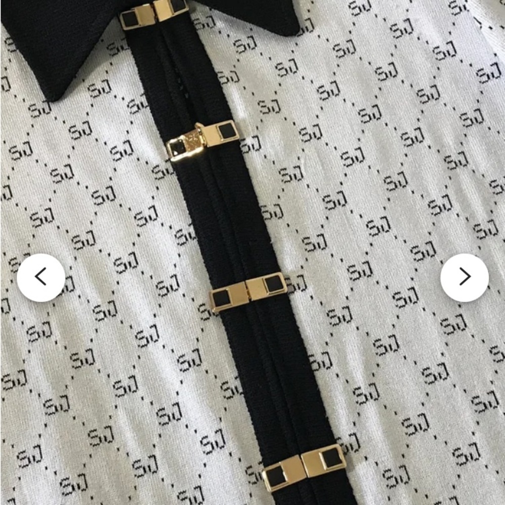 COPY - Vintage St. John Cardigan Black and White- Size10.
Zip front & gold snap…